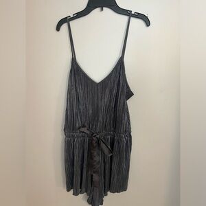 Victoria’s Secret metallic romper‎ in a gunmetal grey shade size M